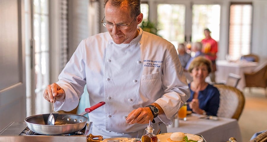 Orchid Island Dining Chef preparing Orchid Island's custom dessert table-side