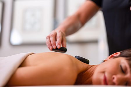 Orchid Island Spa Services orchid island member getting a spa