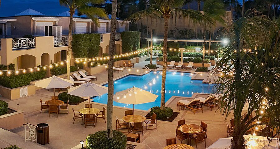 Orchid Island Club Pool orchid island pool lite up at night