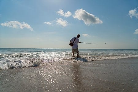 Orchid Island Beach Surf Fishing Man Fishing in the surf on Orchid Island's Beach