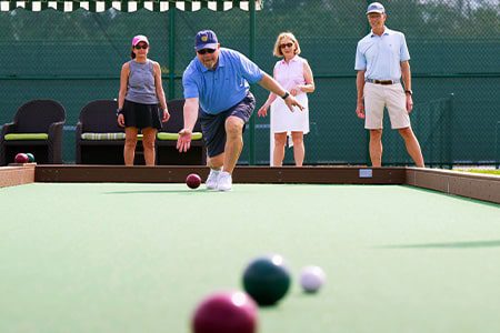 Bocce Ball Orchid Island members playing Bocce Ball